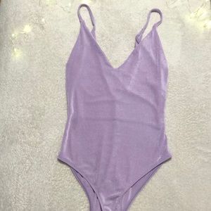 Purple bodysuit with plunging neckline ❤️